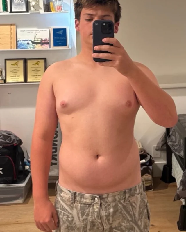 Gunner before: higher body fat, no visible muscle definition